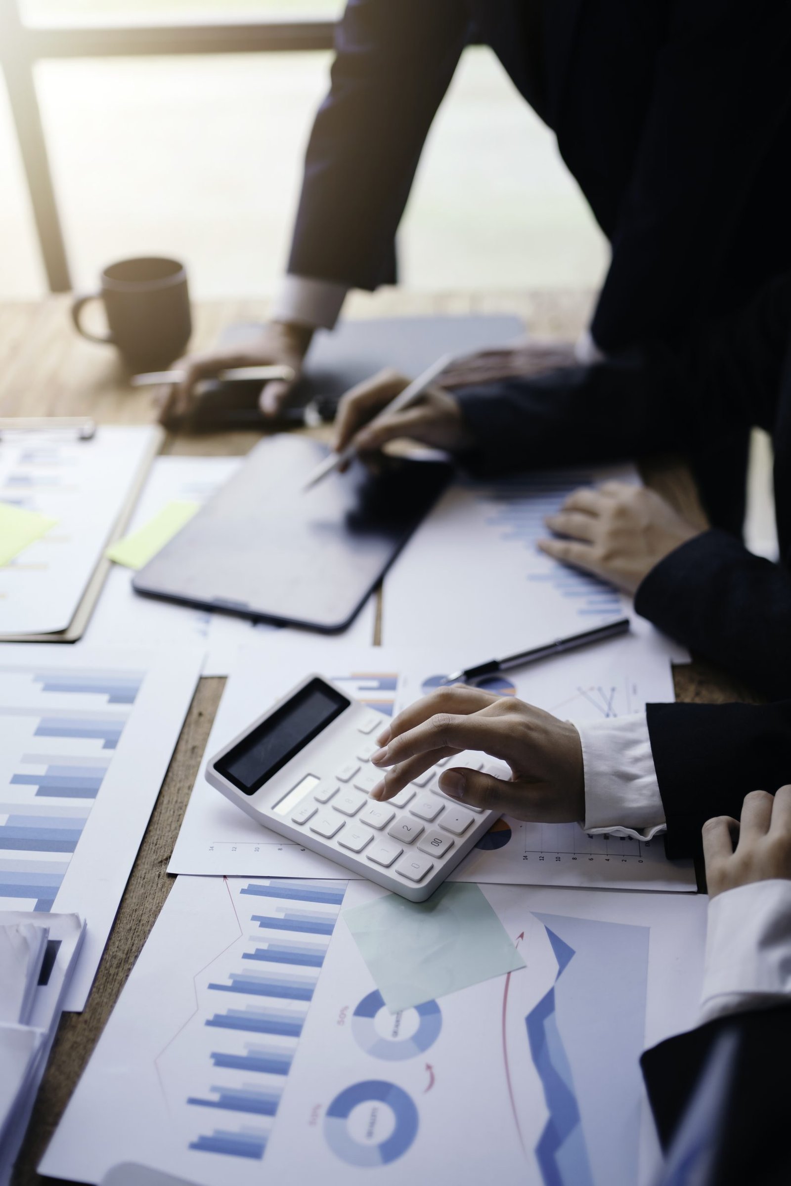 A group of young business people works together in the office. Concept